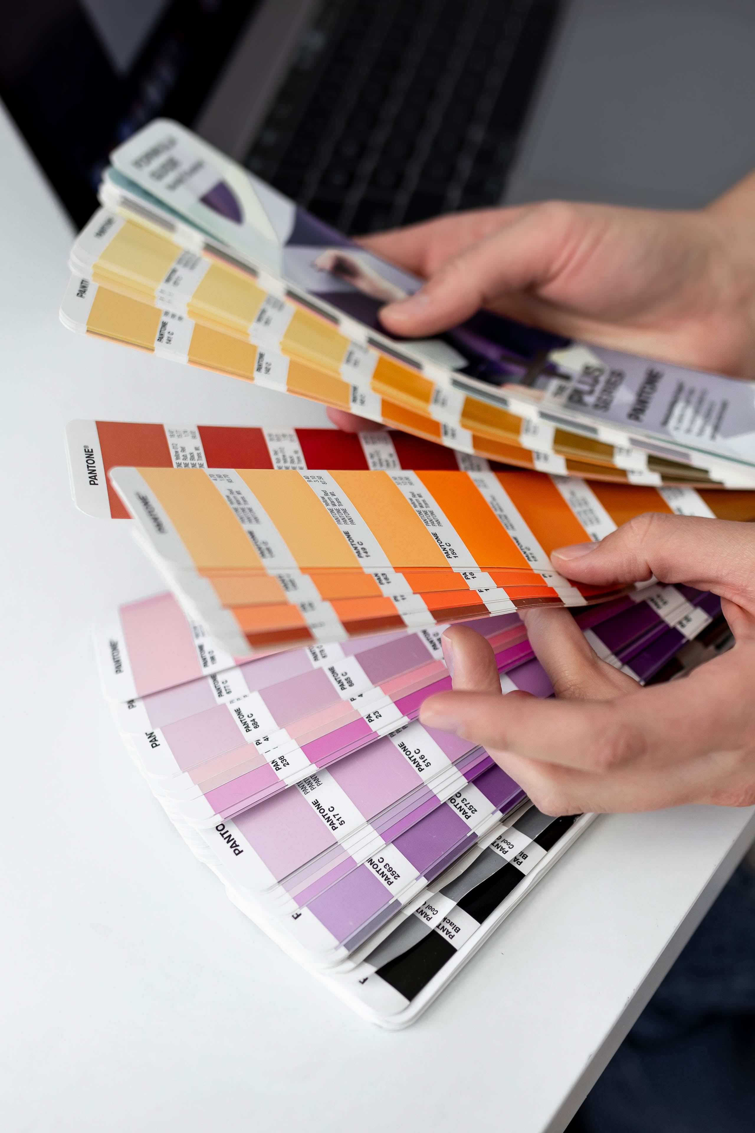 a person looking through color swatches