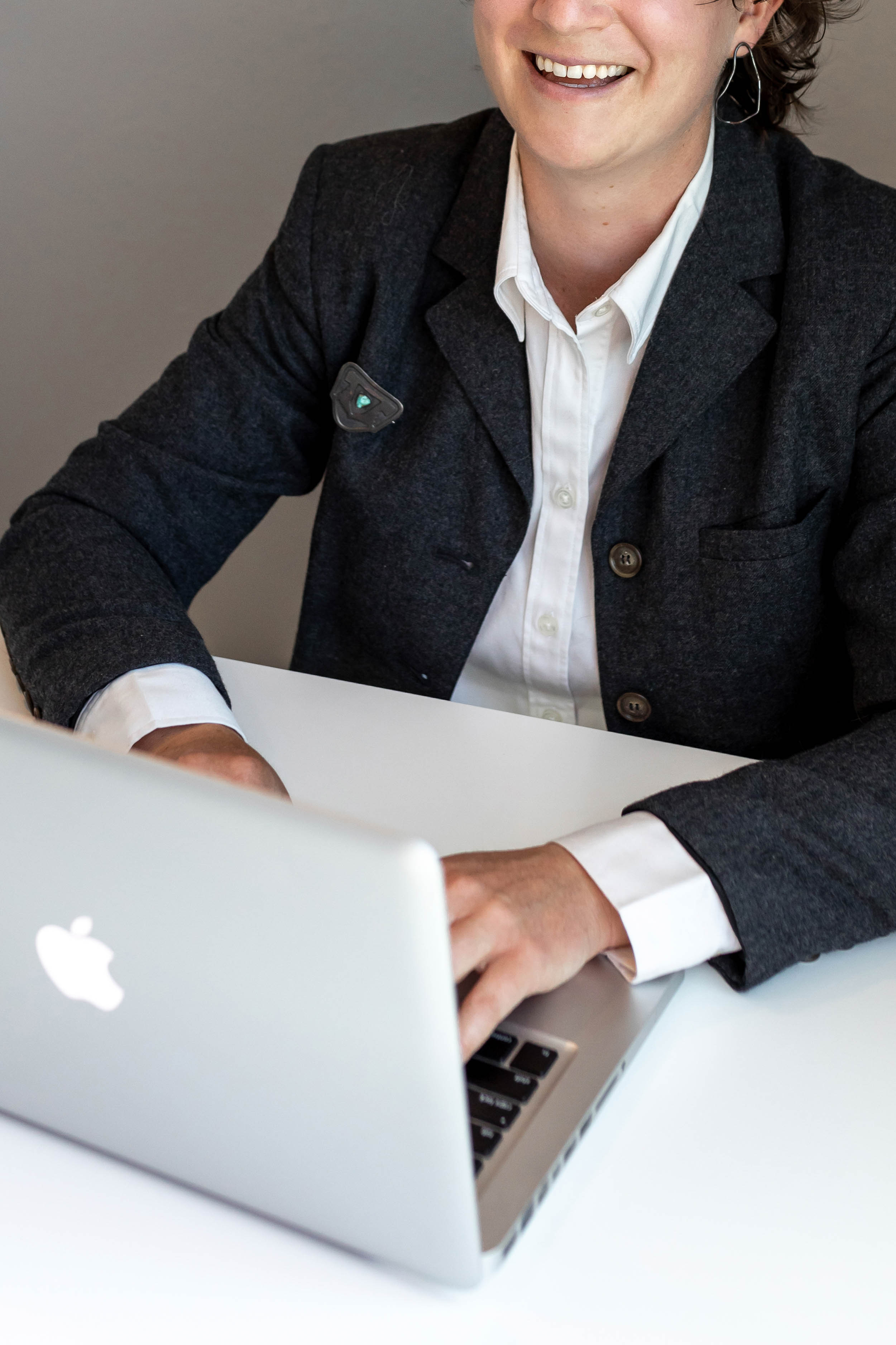 a person typing on a laptop