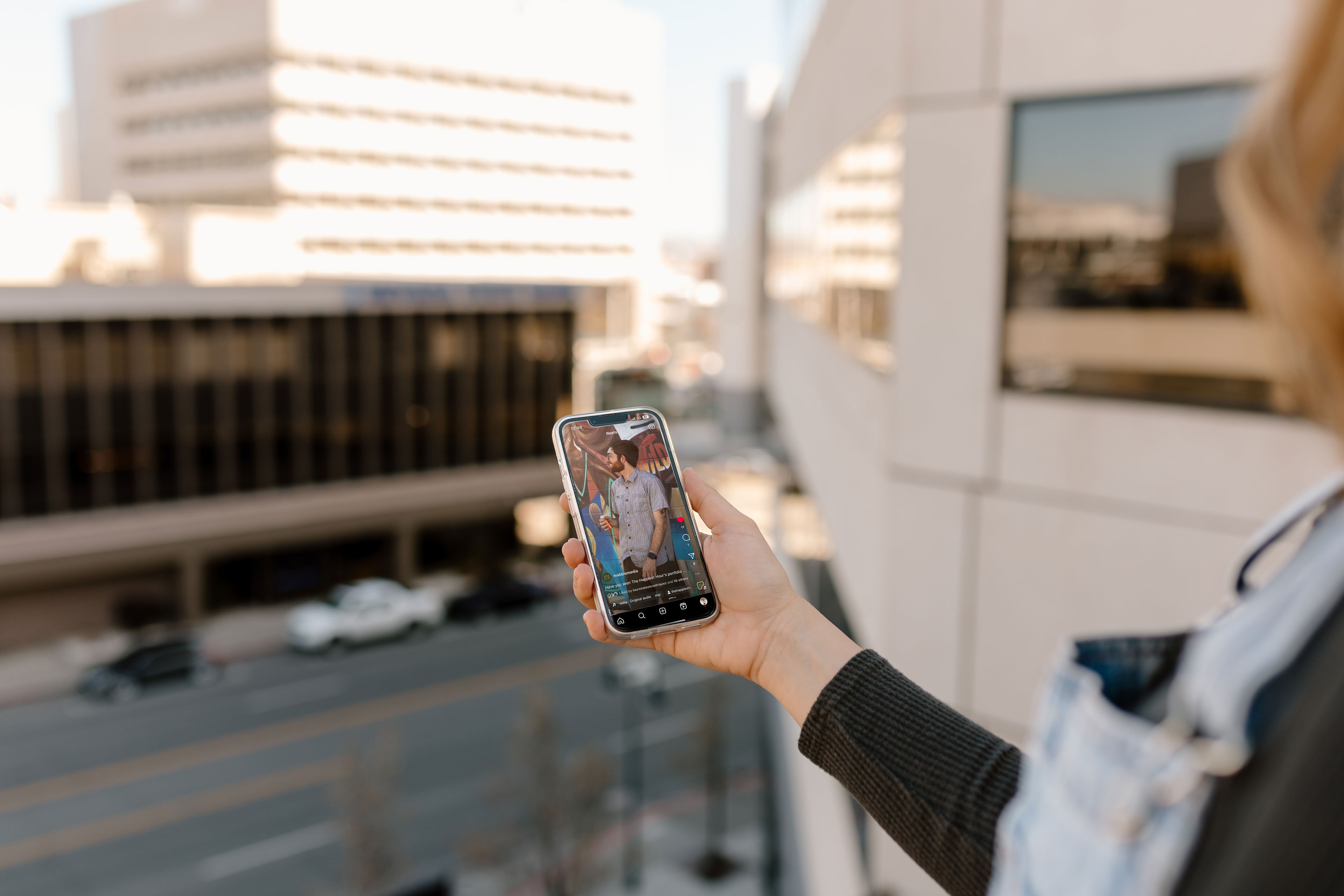 someone watching a video on their iphone