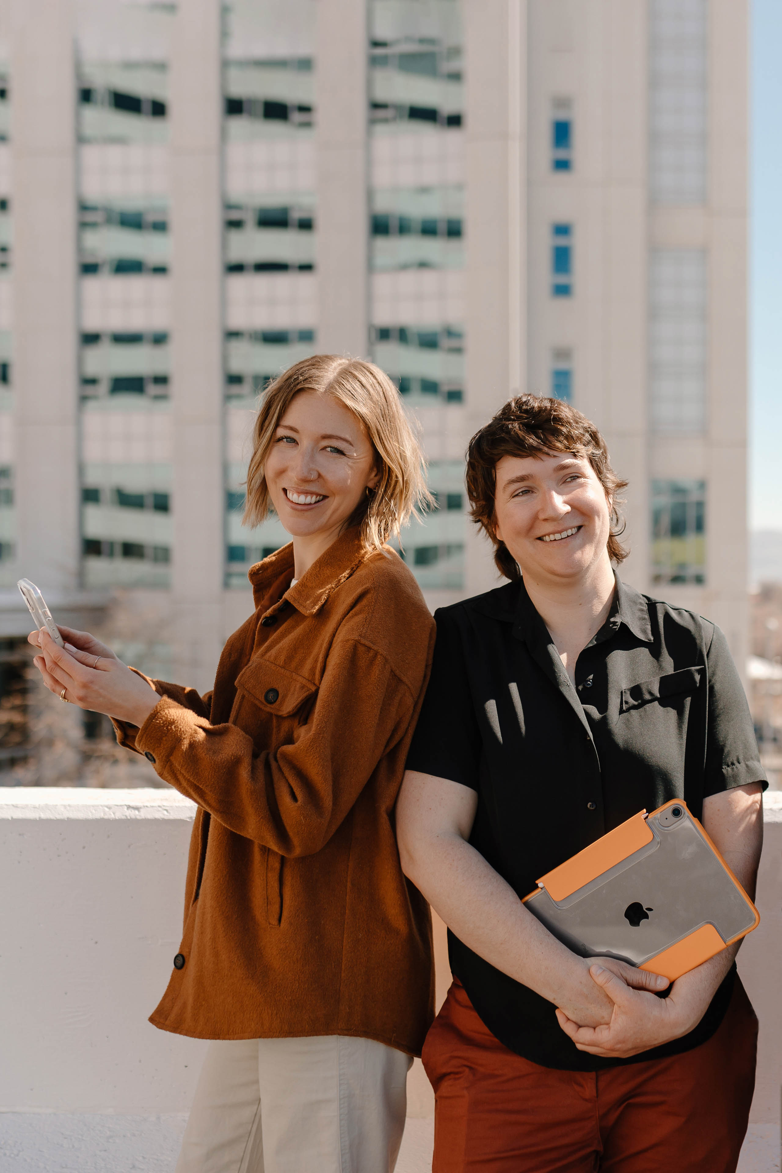 mabble media staff members standing back to back smiling